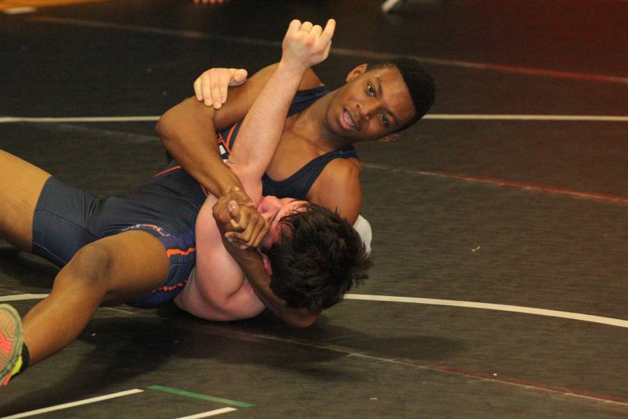 Elijah Cox waits for the pin to be called at the Iron Man Tournament