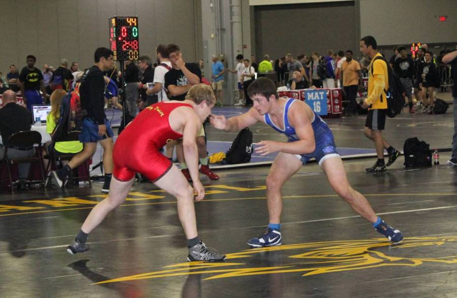 Matthew Sells and Tucker Russo wrestle at the Southeast Regions