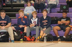 Blackman Wrestlers and Coaches Look ON